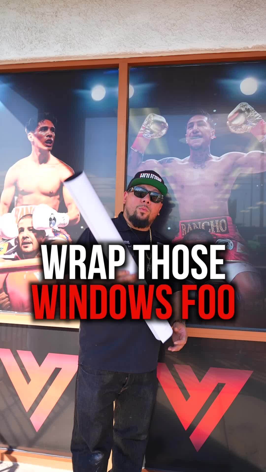 Houdini Wraps founder in front of Vargas Boxing Gym storefront featuring large boxing athlete graphics in Las Vegas