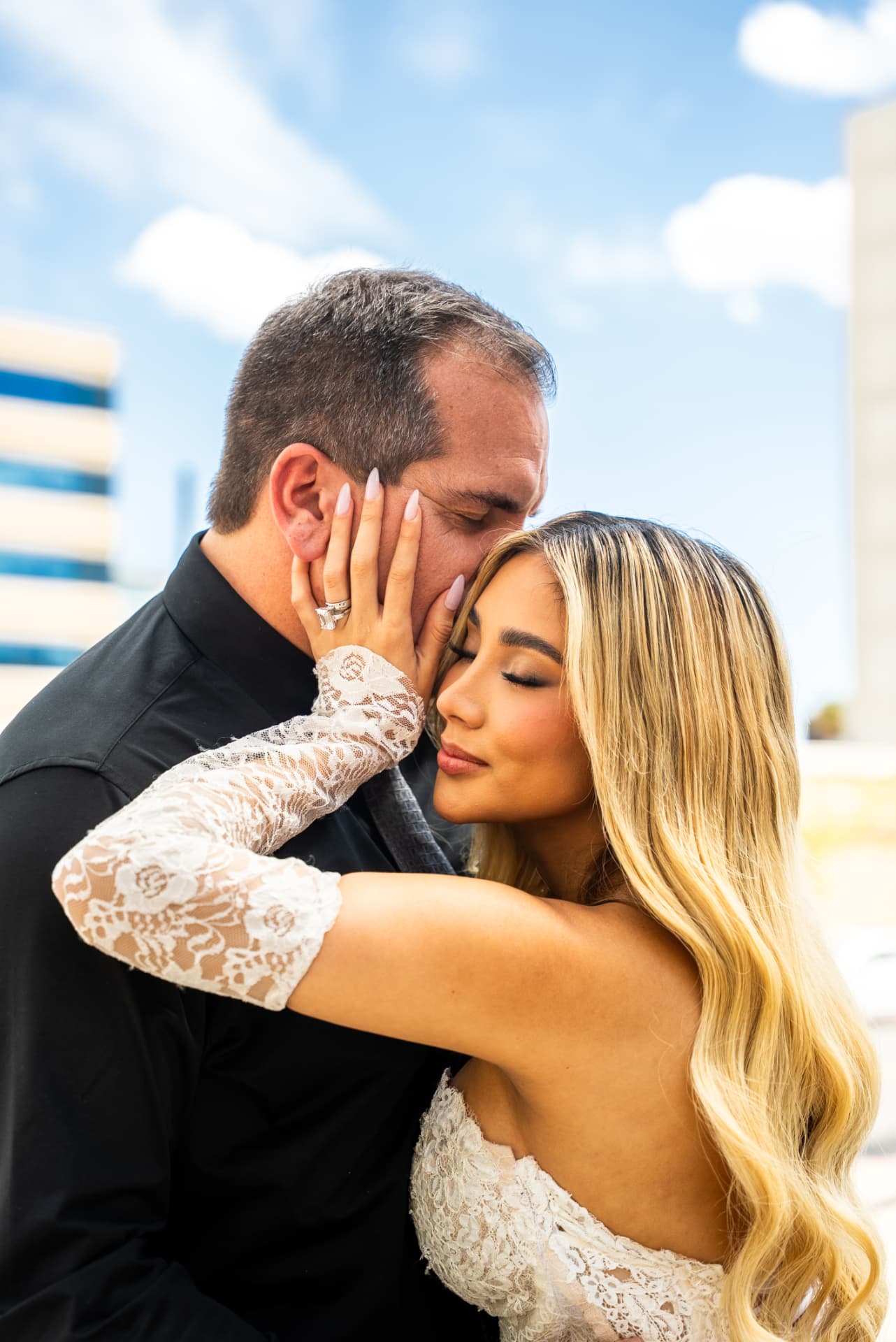 Las Vegas wedding vertical cut, close embrace