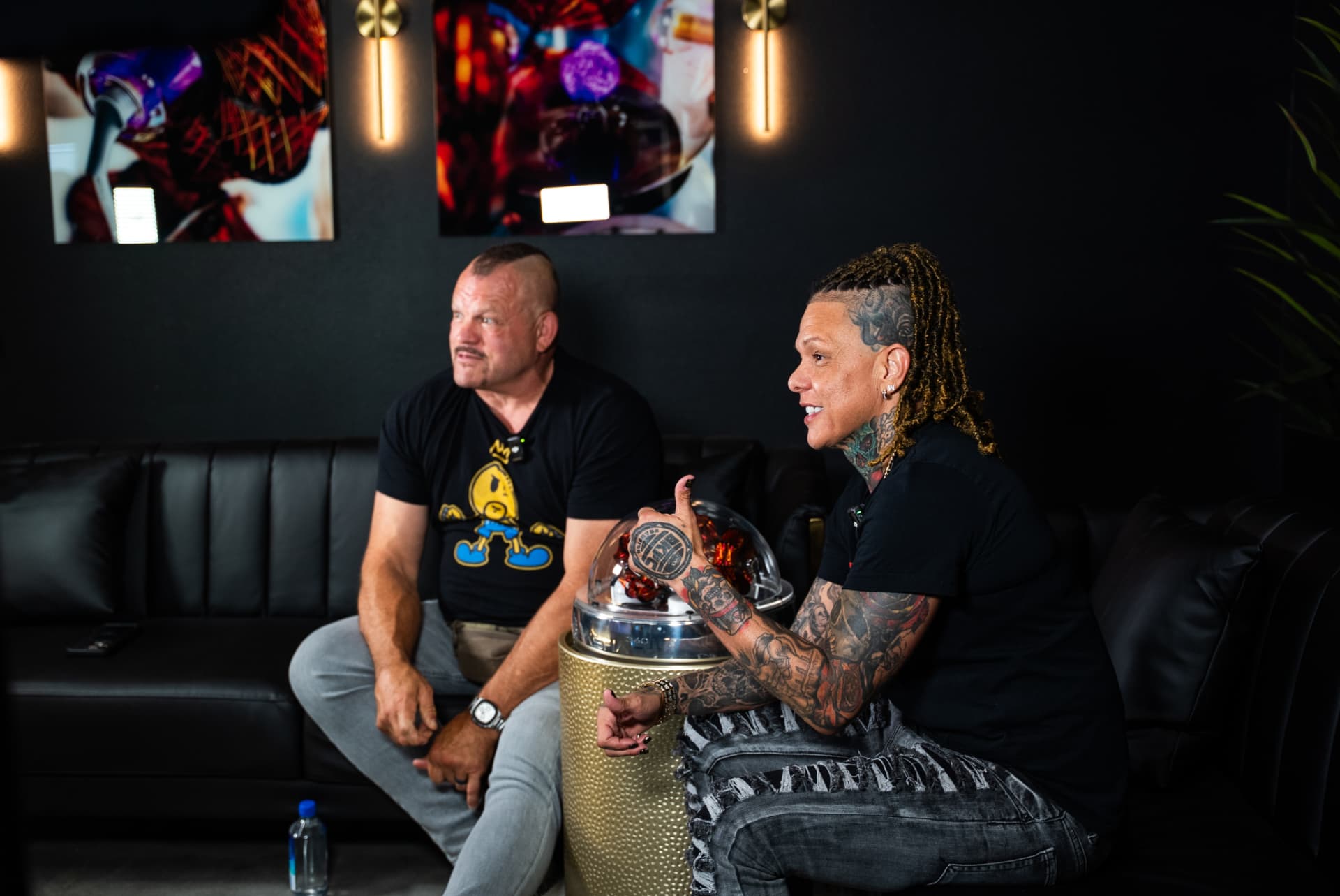 Two people in conversation during a Cross X Agency production shoot
